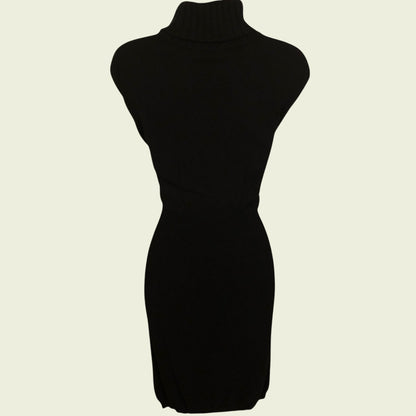 Black dress on a mannequin against a white background