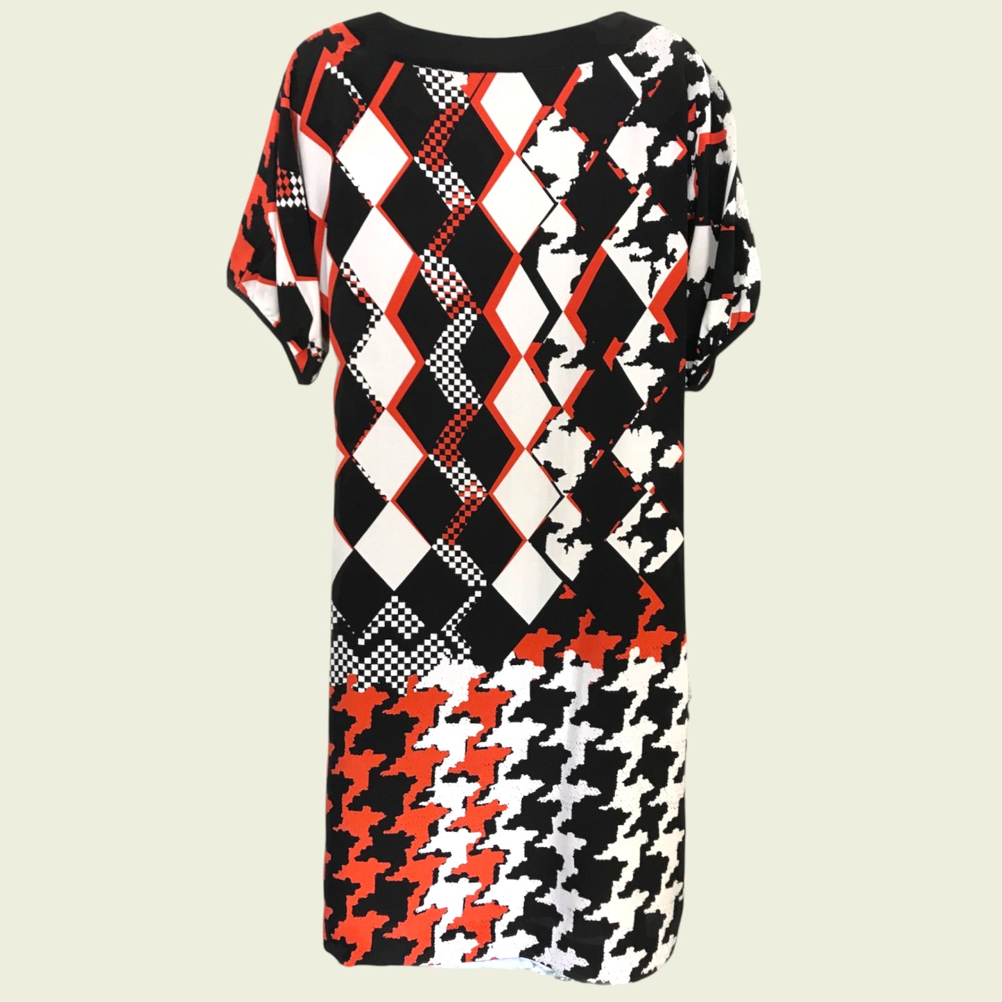 Dress with geometric pattern on a beige background