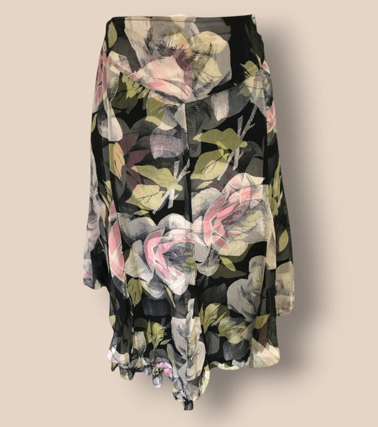 Floral patterned skirt on a beige background