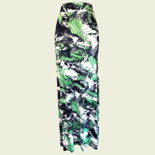 Green, black and white skirt on beige background