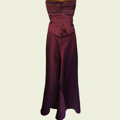 Maroon strapless top and wide-leg pants on a beige background