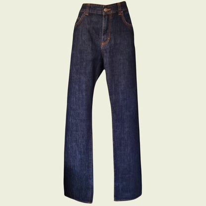 Pair of blue jeans on a beige background