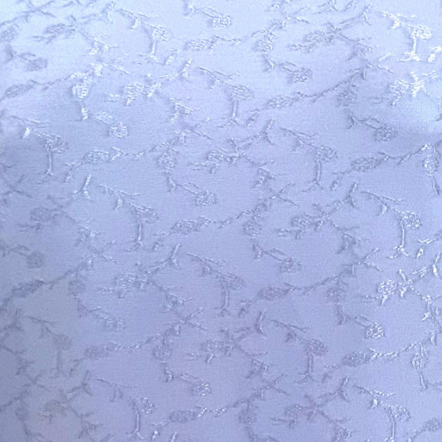 Textured light blue background with subtle patterns