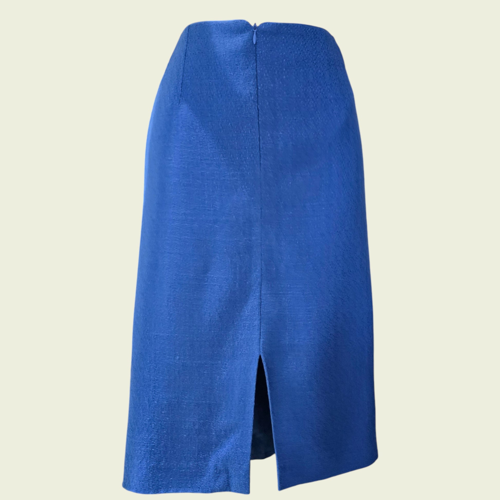 Blue skirt on a beige background