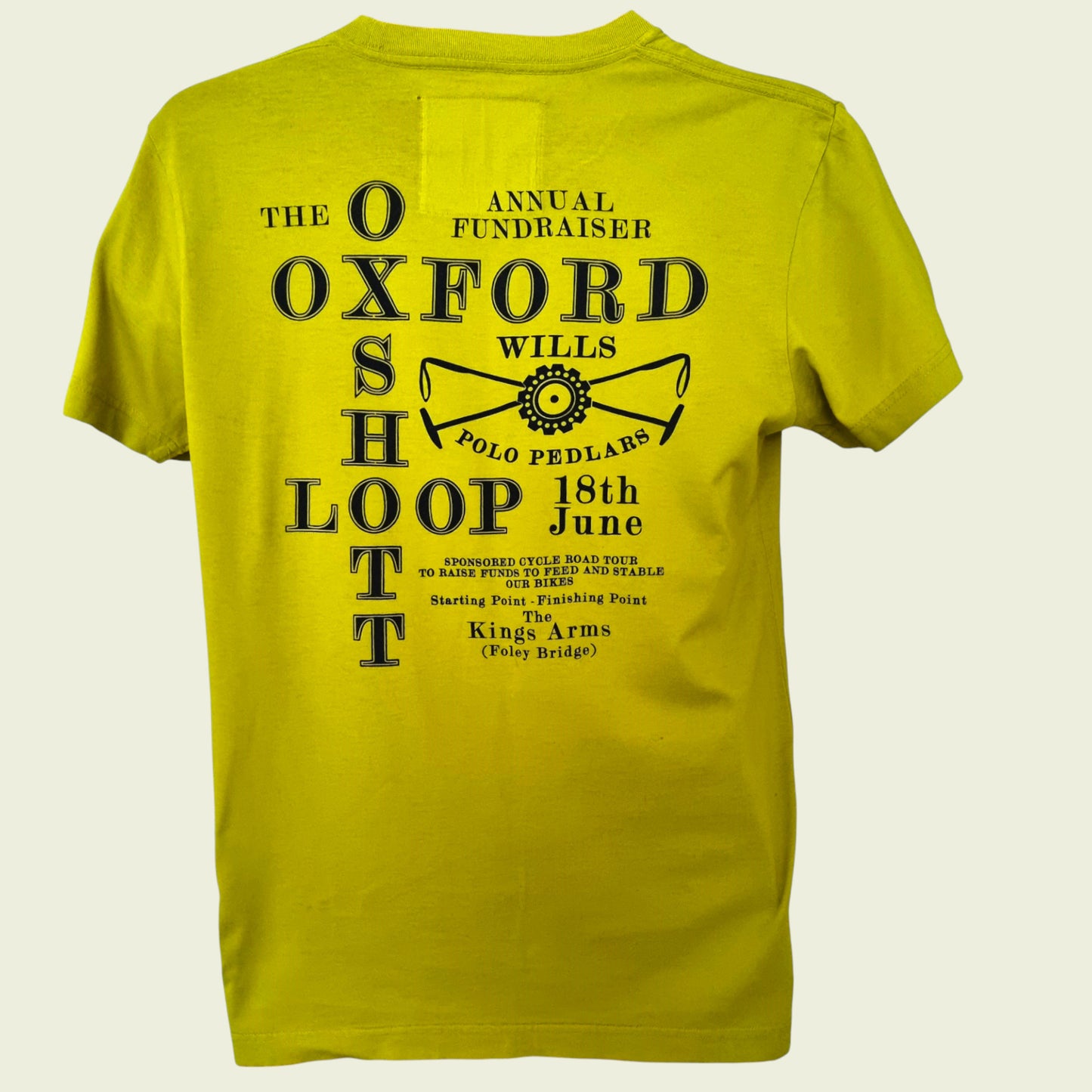 Mannequin wearing an olive green T shirt on beige background