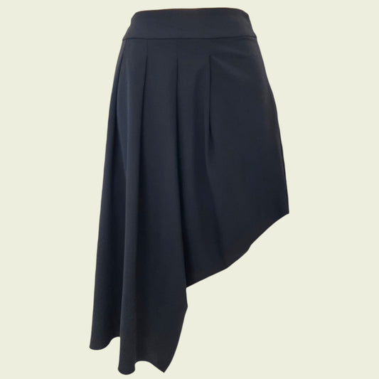 Black asymmetric skirt on beige background