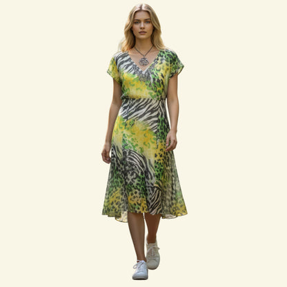 Gerry Weber grey, yellow, and green silk empire dress with animal print and beaded neckline. UK 18.