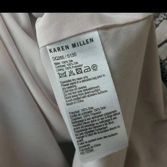 Clothing label with 'Karen Millen' branding on a garment.