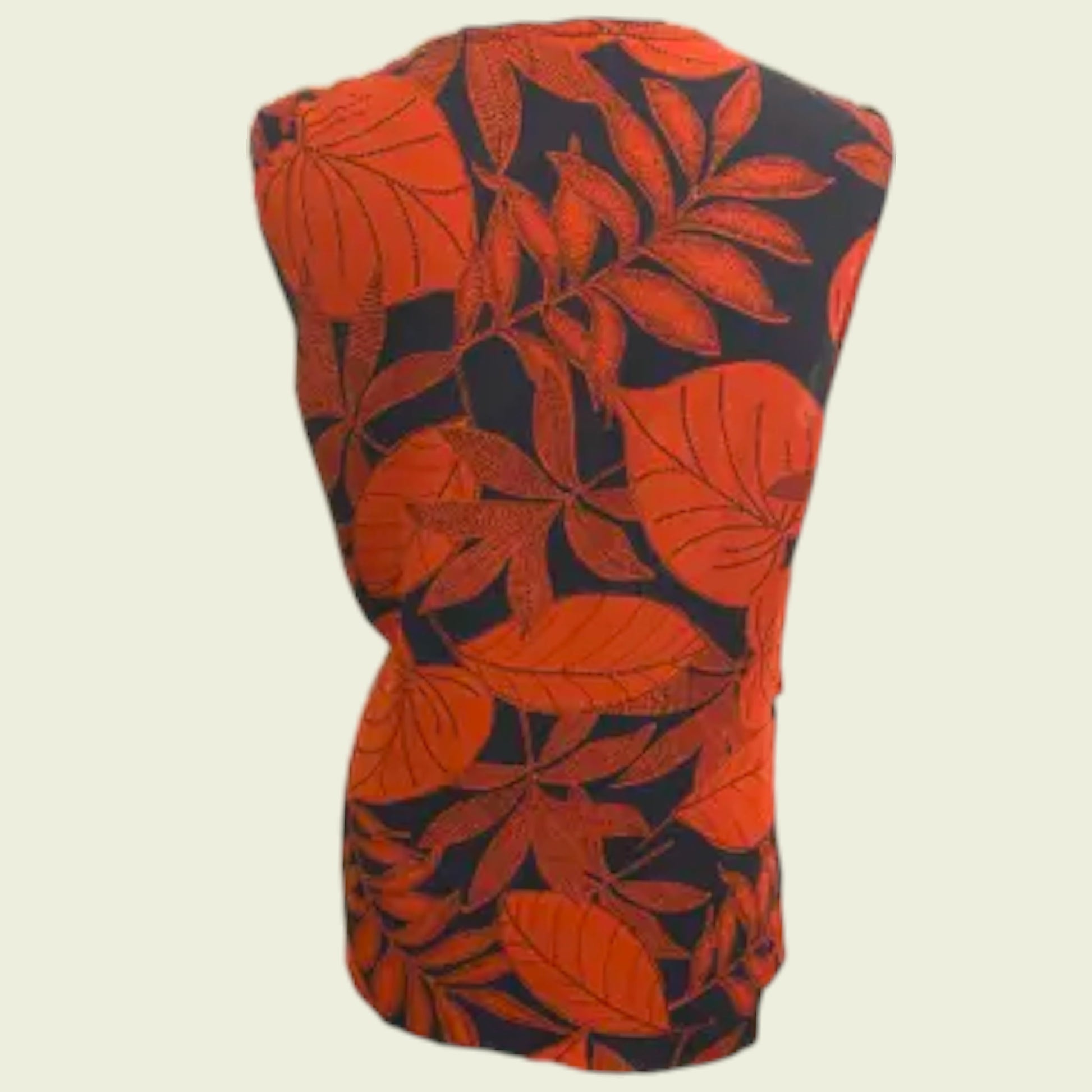 Top with red and black leaf pattern on a beige background