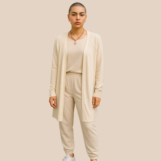 Model wearing beige waterfall cardigan on beige background