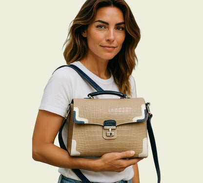 Woman holding a beige handbag with a white background