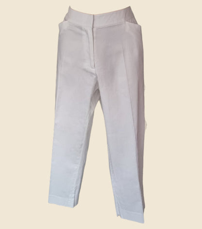 White pants on a beige background