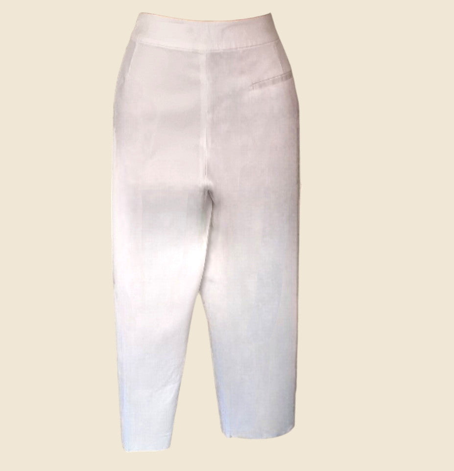 White leggings on a beige background