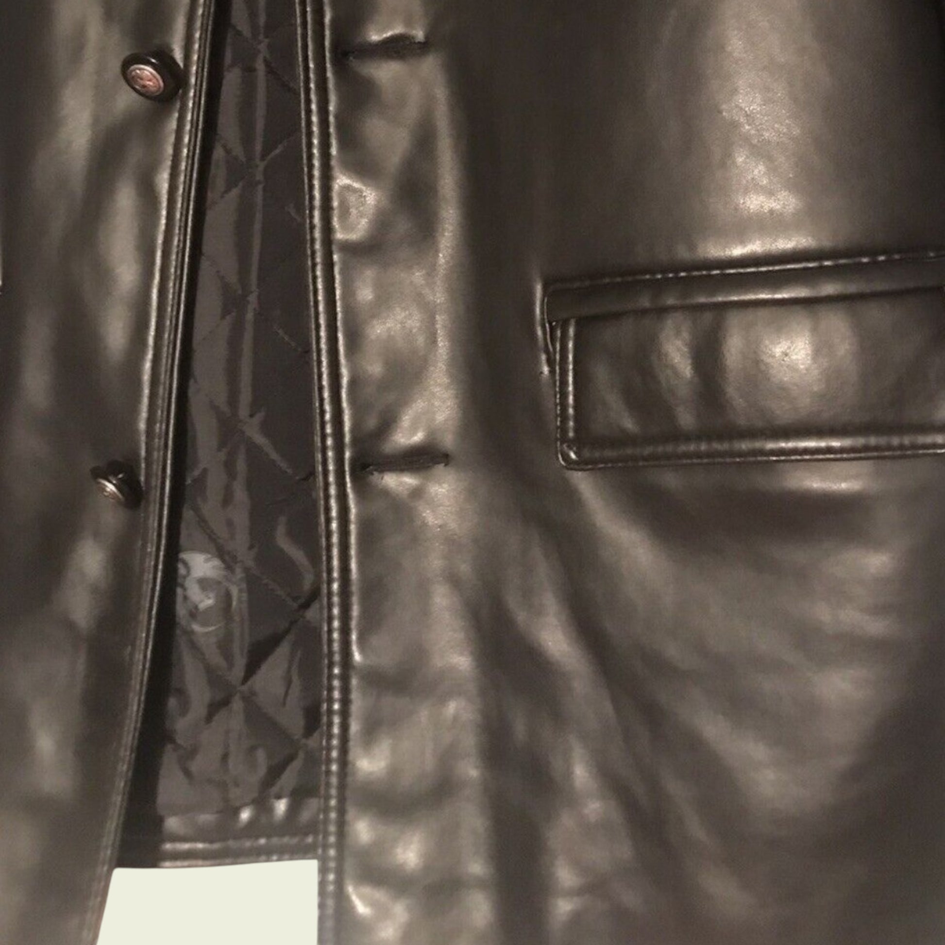 Close-up of a Black leather jacket with quilted lining