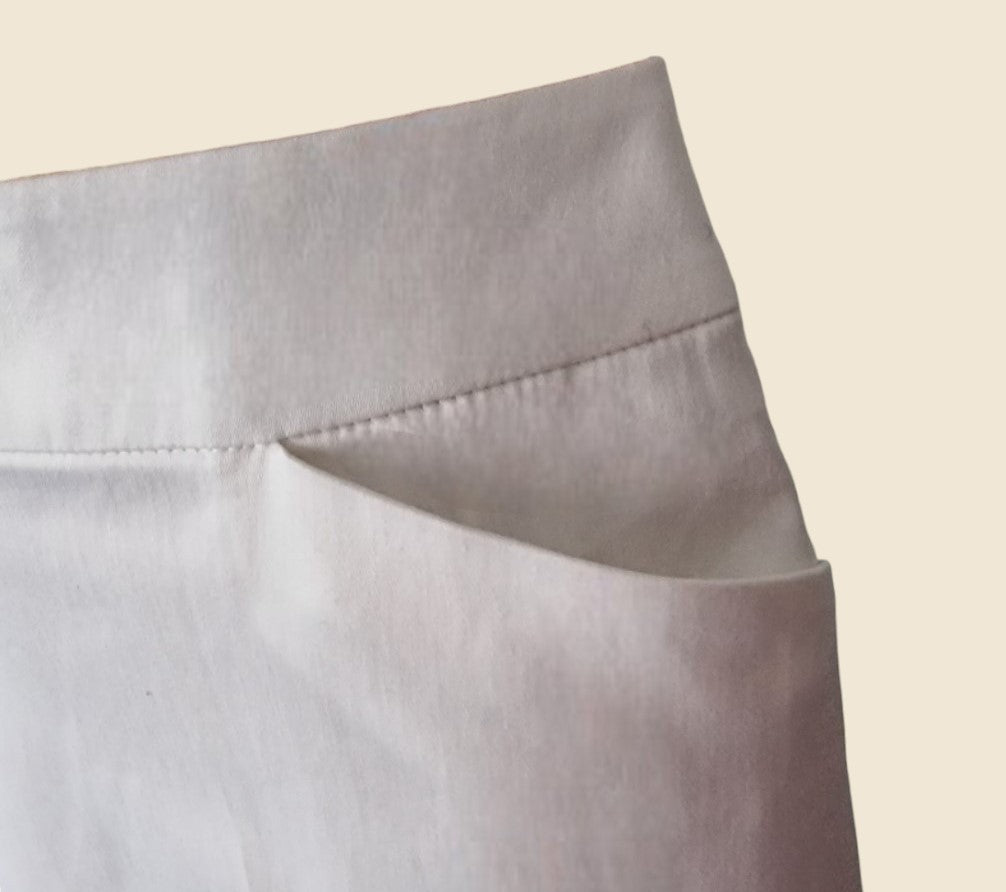 Close-up of a white fabric on a beige background