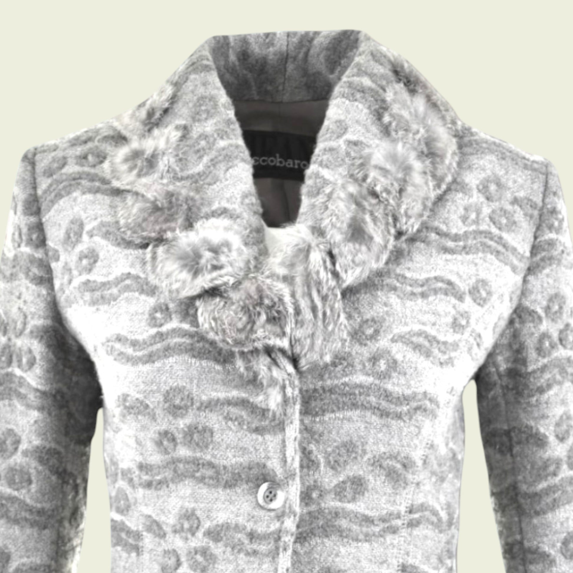 Gray patterned coat with floral details on a beige background