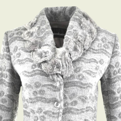 Gray patterned coat with floral details on a beige background