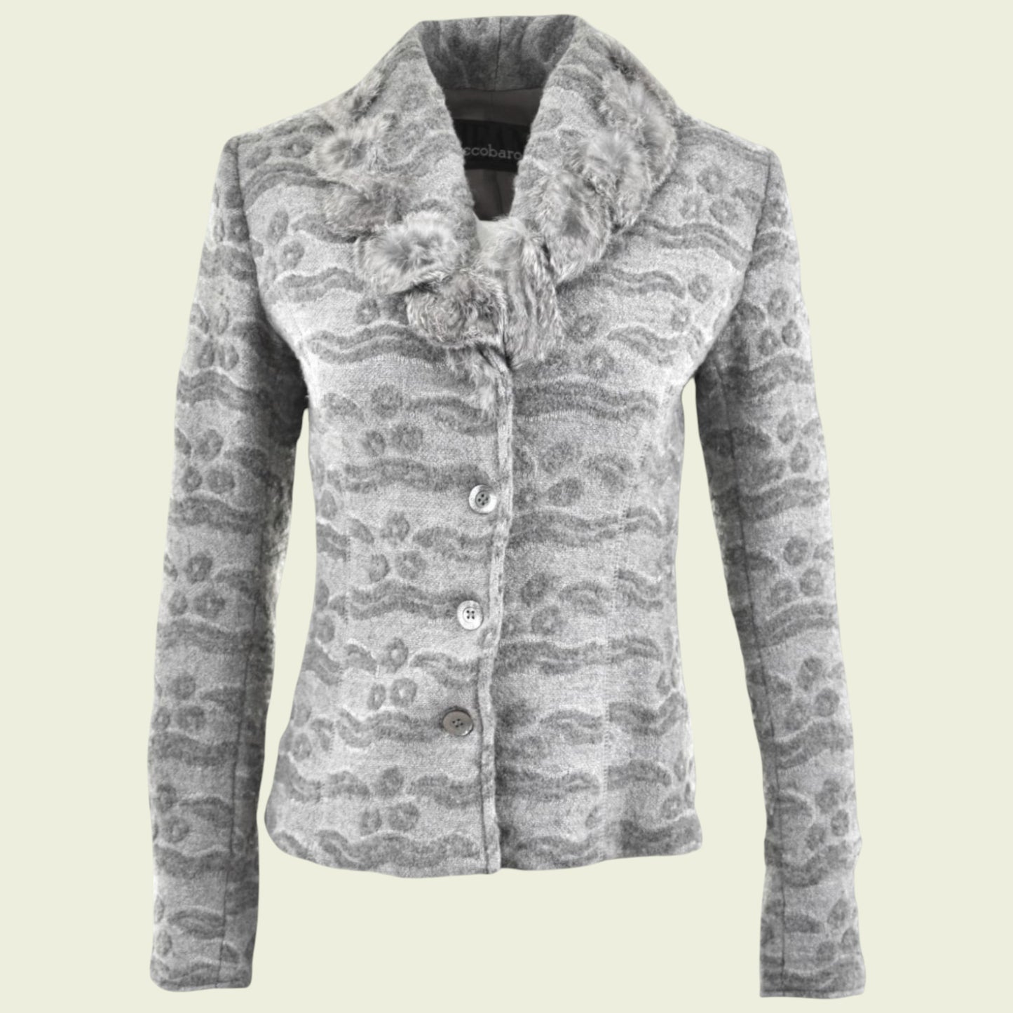 Gray patterned jacket on a beige background