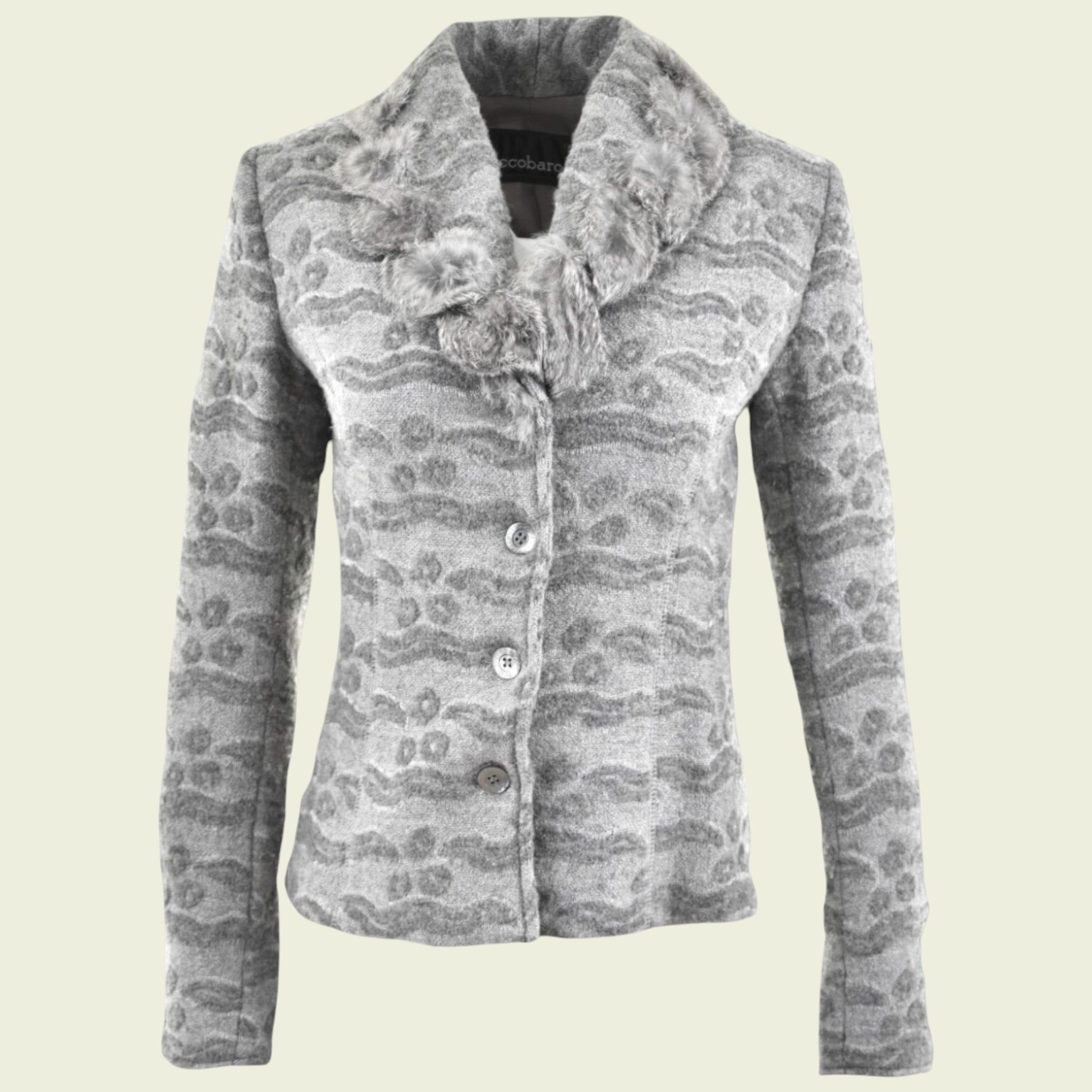 Gray patterned jacket on a beige background
