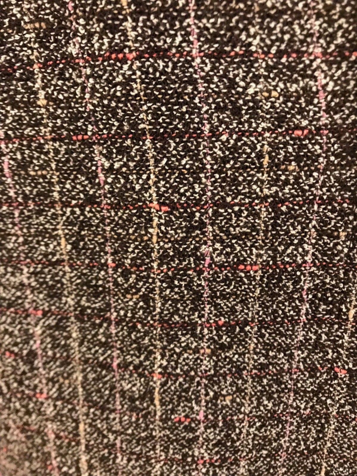 Close-up of a textured fabric with a checkered pattern