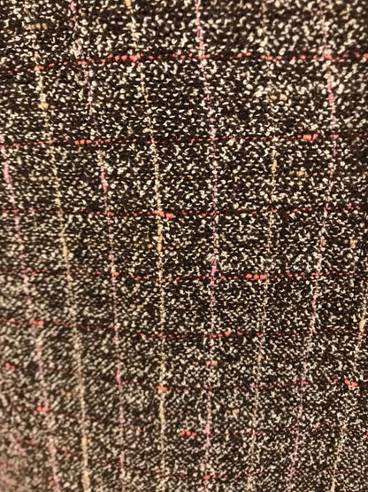 Close-up of a textured fabric with a checkered pattern