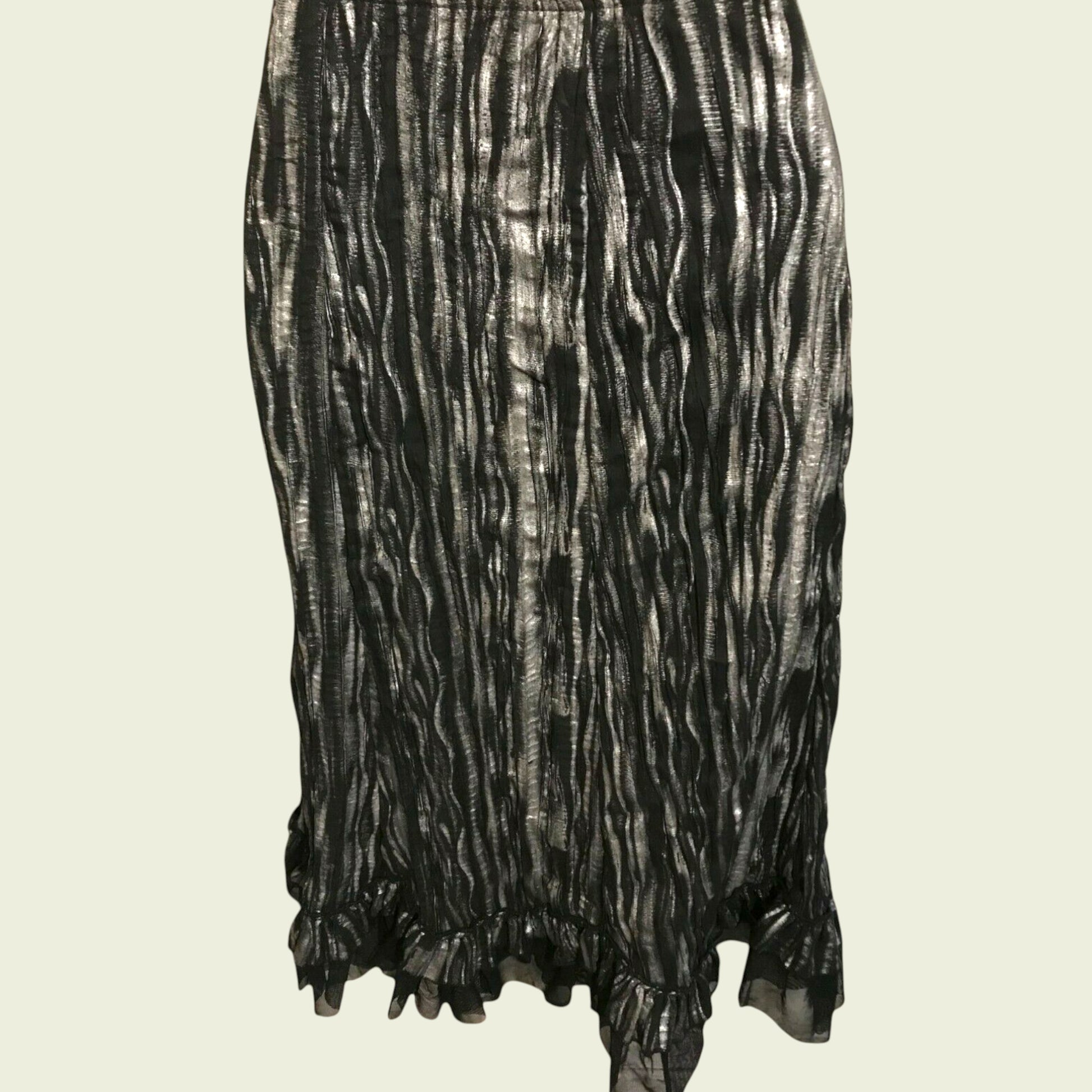 Black and white patterned skirt on a beige background