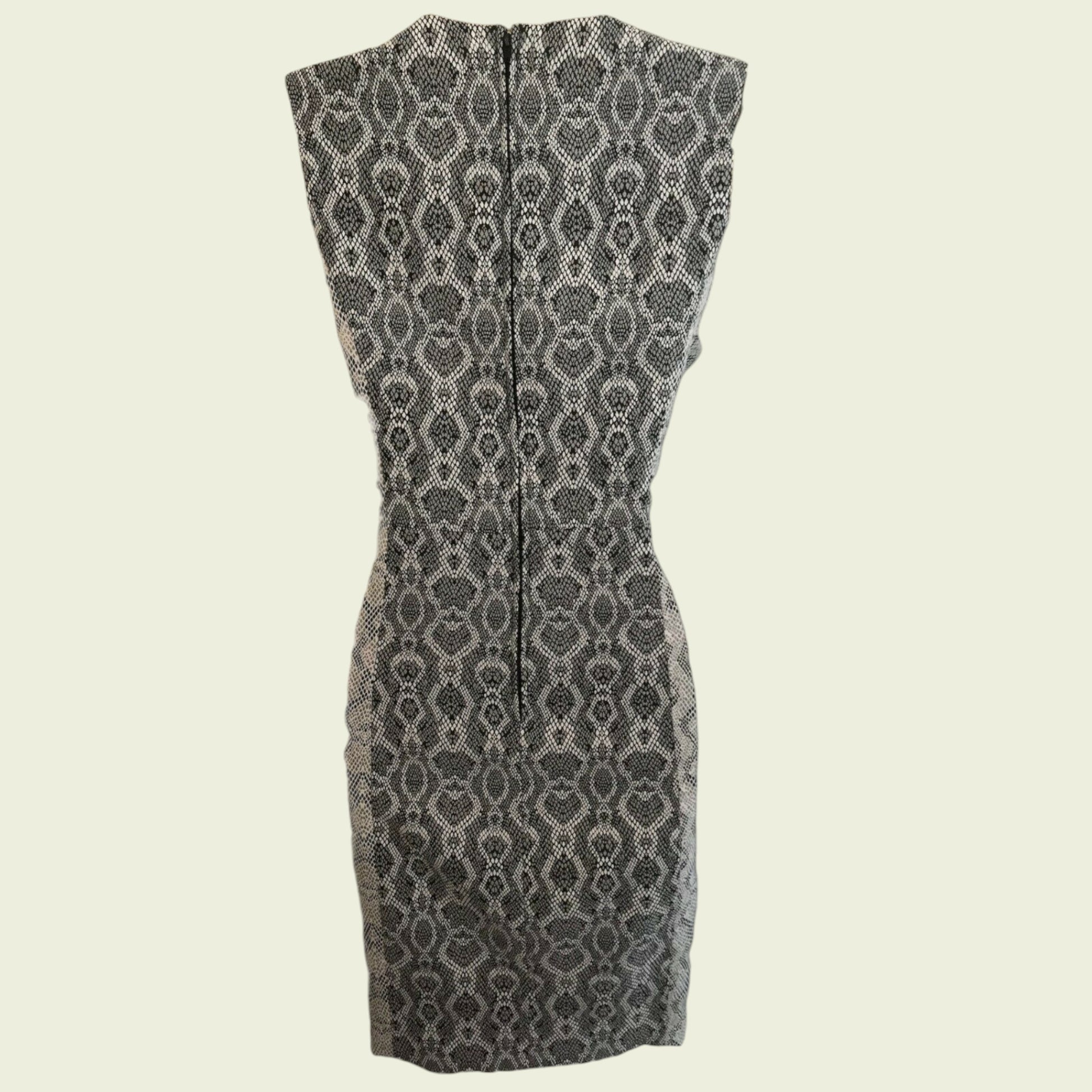 Black and white patterned dress on a beige background
