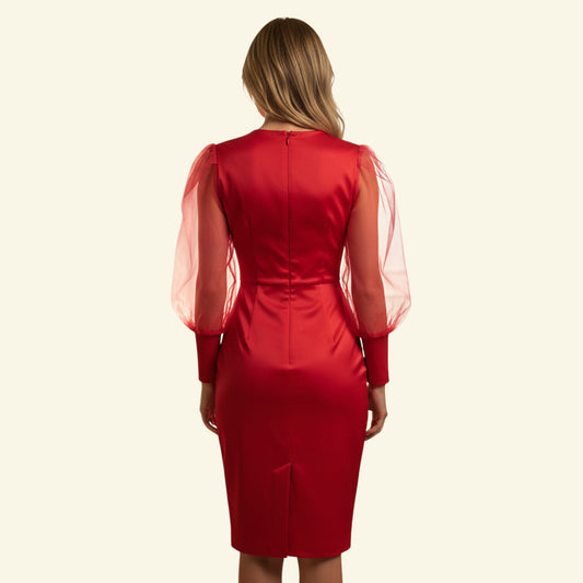 Timelessfashion pink organza puff sleeve wrap dress with back split hem. Polyester fabric.
