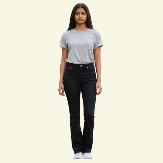 Timelessfashions black bootcut jeans with contoured mid-rise waist and classic bootcut leg. Made from cotton blend.