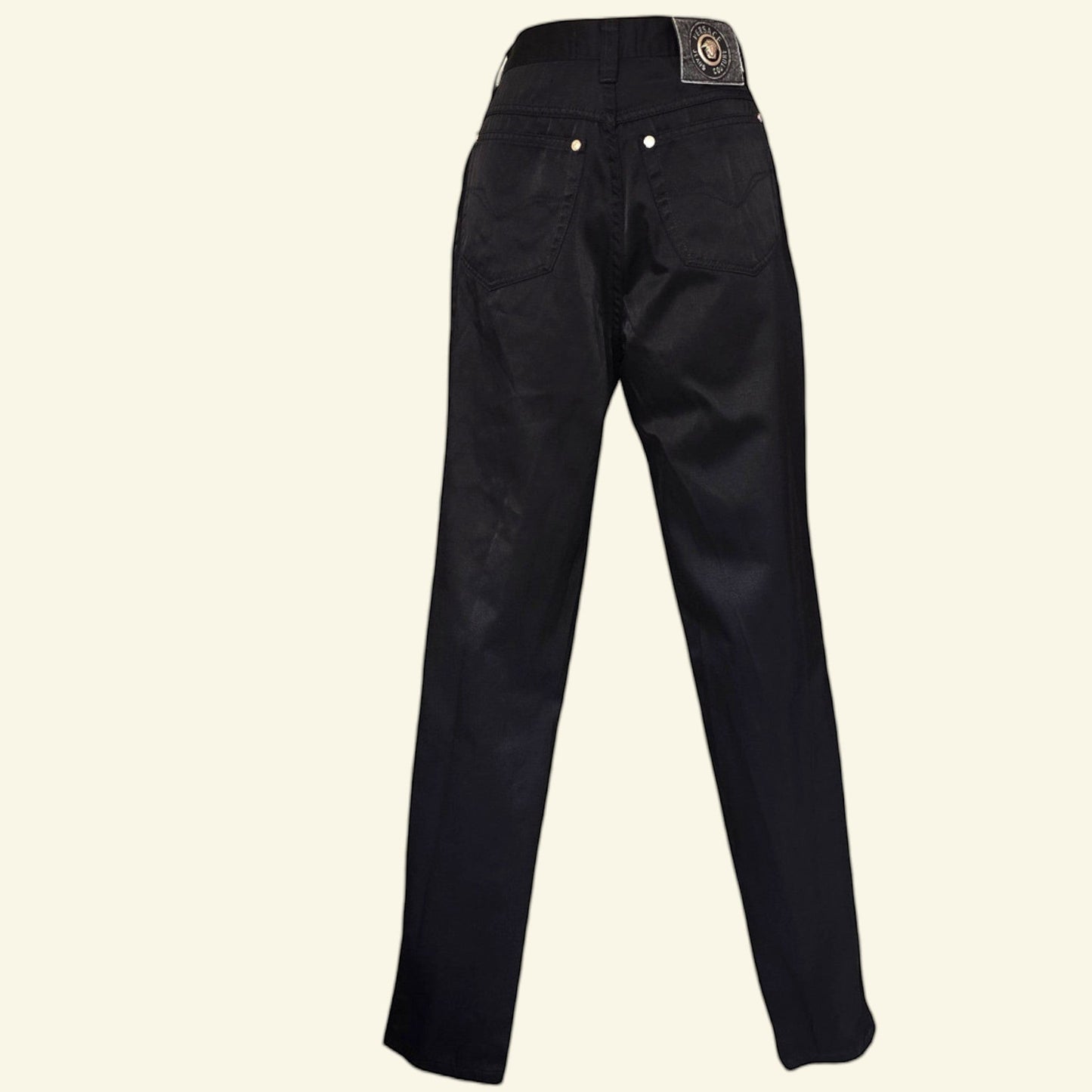 Timelessfashions Versace black cotton skinny jeans with gold button details and a leather logo patch.