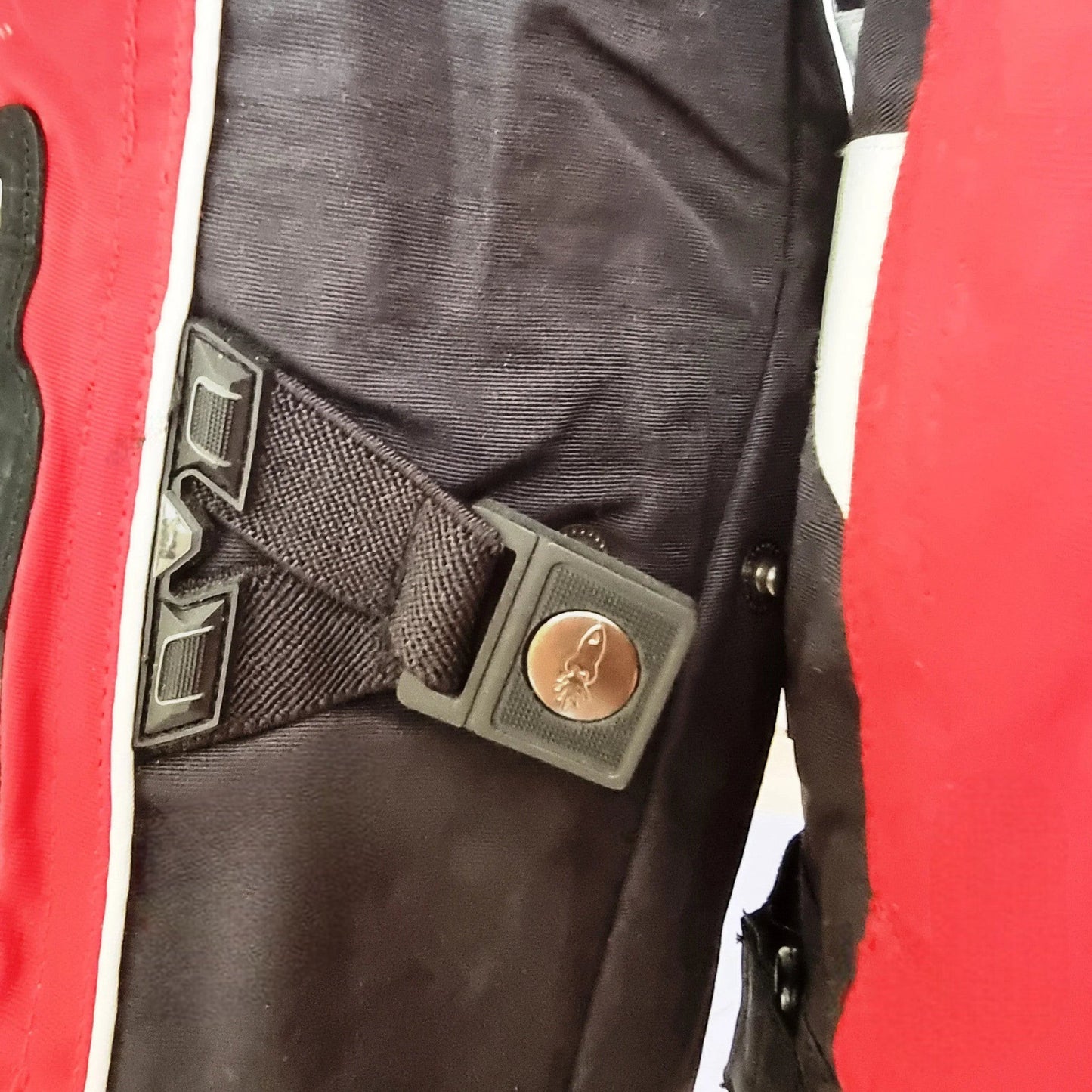 Timelessfashions Honda Joe Rocket red and black women's motorbike jacket with adjustable straps and protective padding.