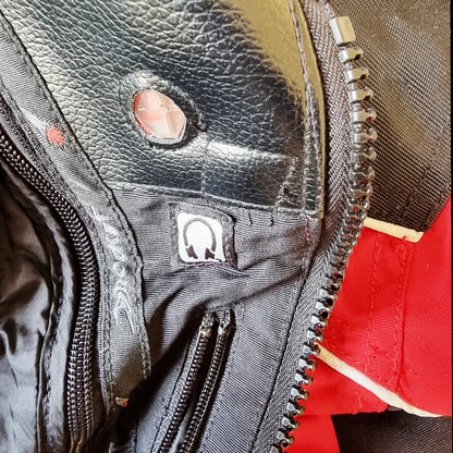 Timelessfashions Honda Joe Rocket women's black and red motorbike jacket with adjustable straps, protective padding, and zippered pockets.