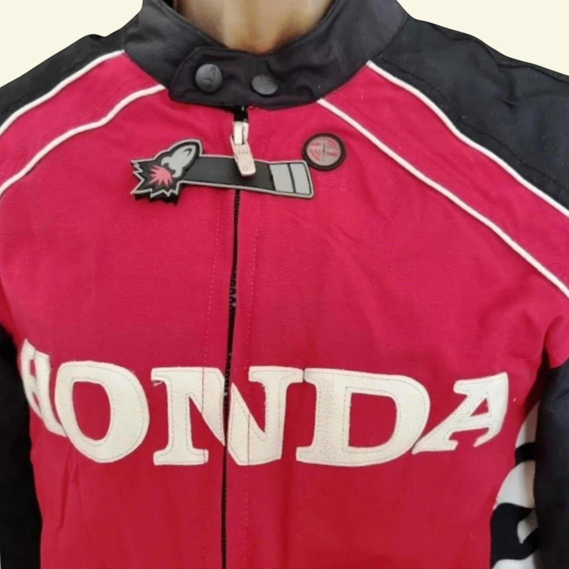 Timelessfashions Honda women's red and black motorbike jacket with white accents, adjustable straps, and protective padding.