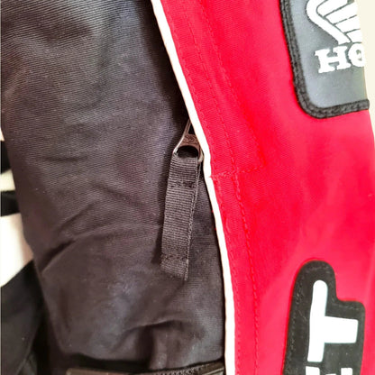 Timelessfashions Honda women's red and black motorbike jacket with adjustable straps, protective padding, and Honda logo.