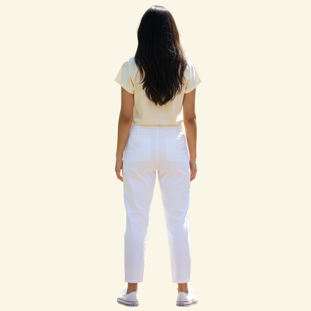 Timelessfashions Malibu Italian white stretch cropped summer trousers with split hem and bow detail. Size UK 10.
