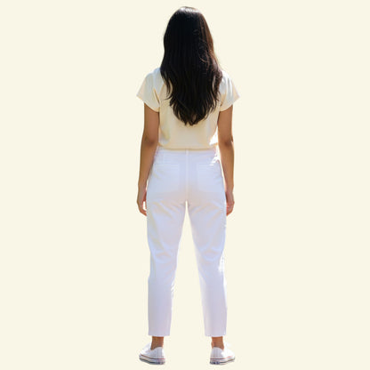 Timelessfashions Malibu Italian white stretch cropped summer trousers with split hem and bow detail. Size UK 10.