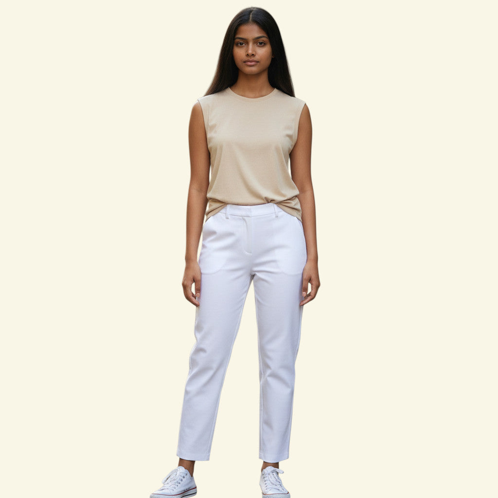 Timelessfashions Malibu Italian white stretch cropped summer trousers with split hem and bow detail. Size UK 10.