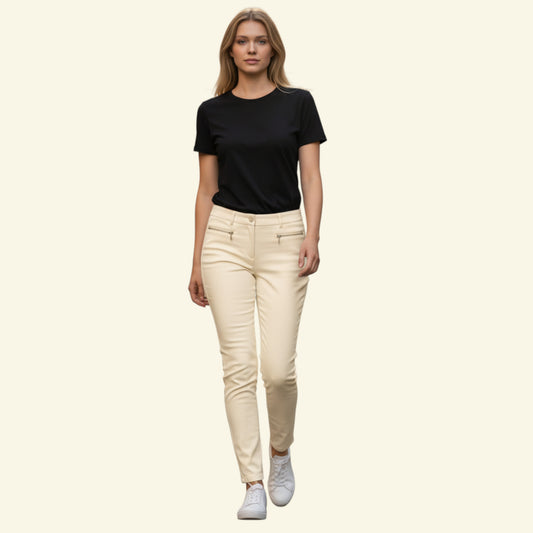 Timelessfashions Marie Mero cream tapered stretch trousers with zip pockets and a button waistband. Polyester blend.
