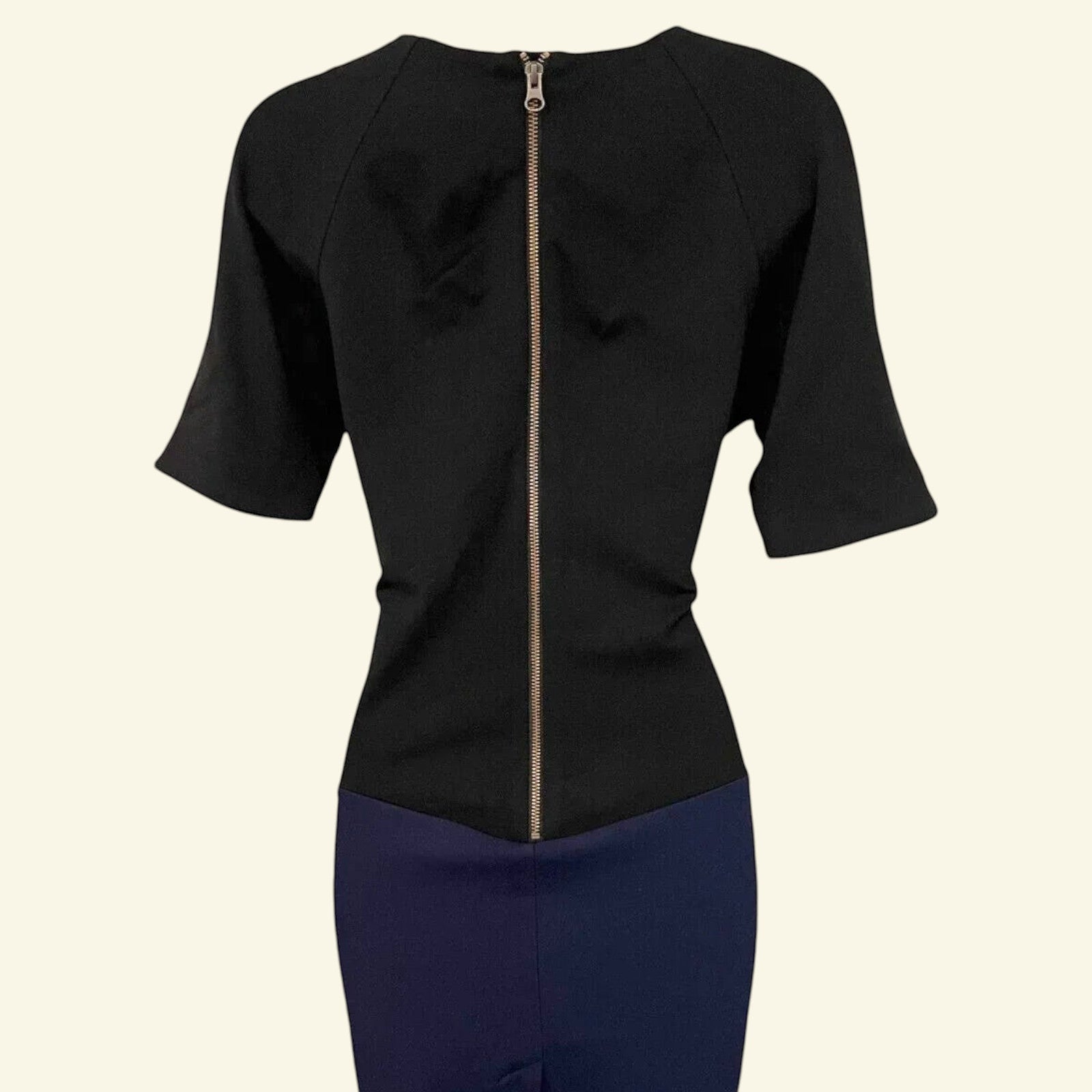 Timelessfashions Mary Portas black & navy colourblock dress with faux leather panel, short sleeves, and zip back. Viscose blend.