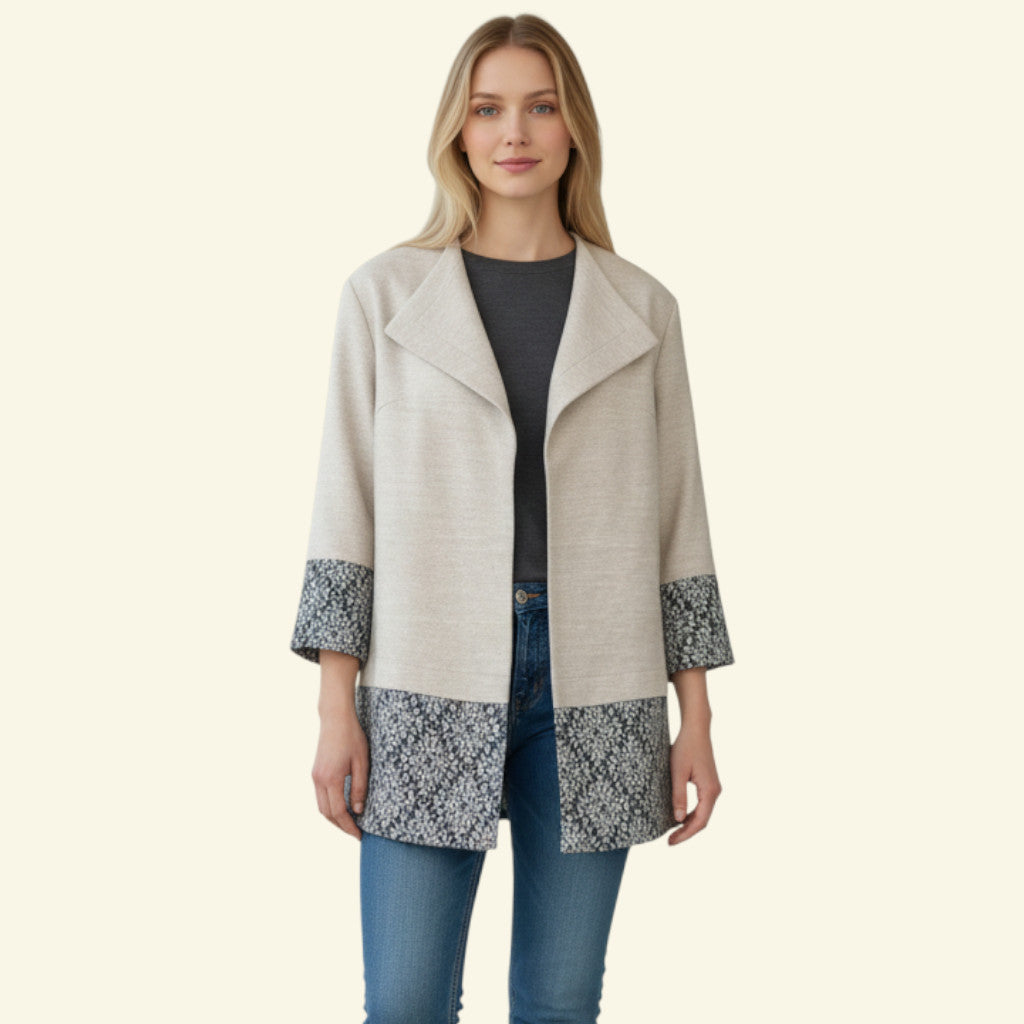 Timelessfashions natural mix long jacket peacoat with patterned cuffs and hem. Women's size UK 10.