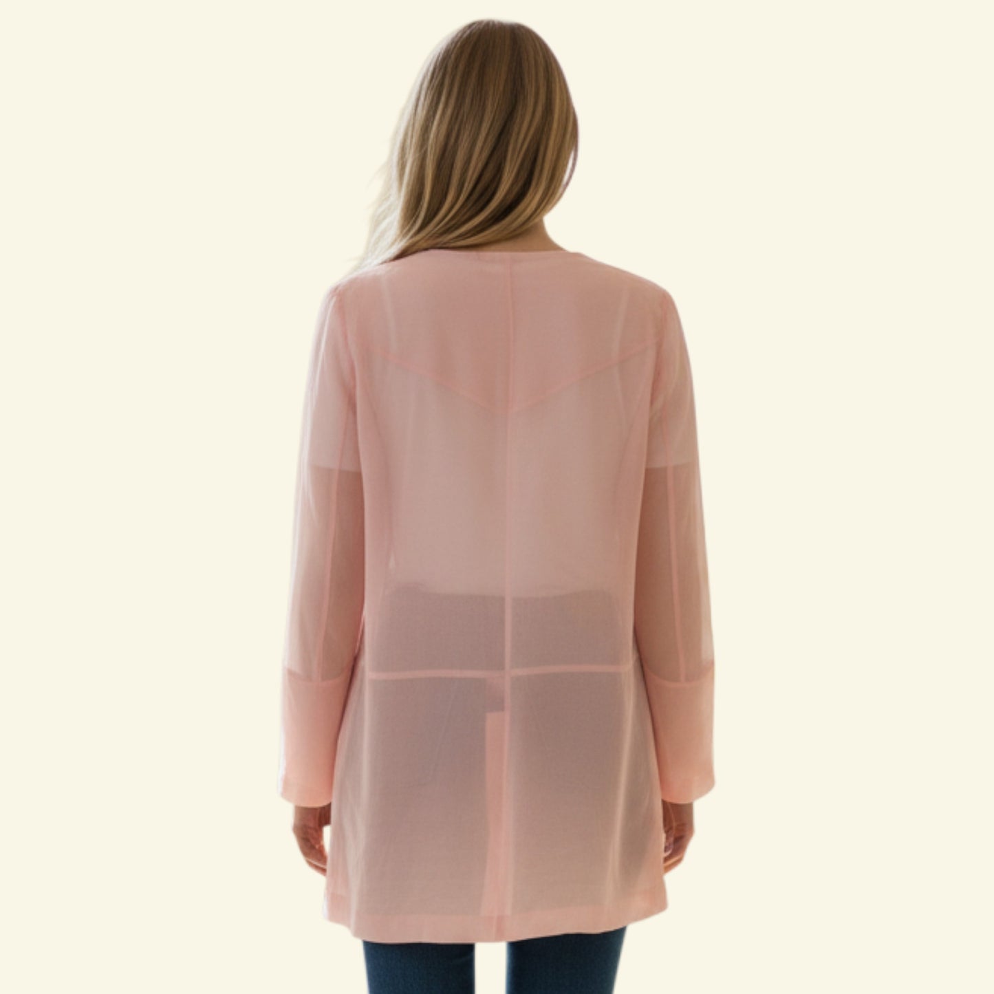 Timelessfashions pink semi-sheer polyester jacket with long sleeves and a relaxed fit.