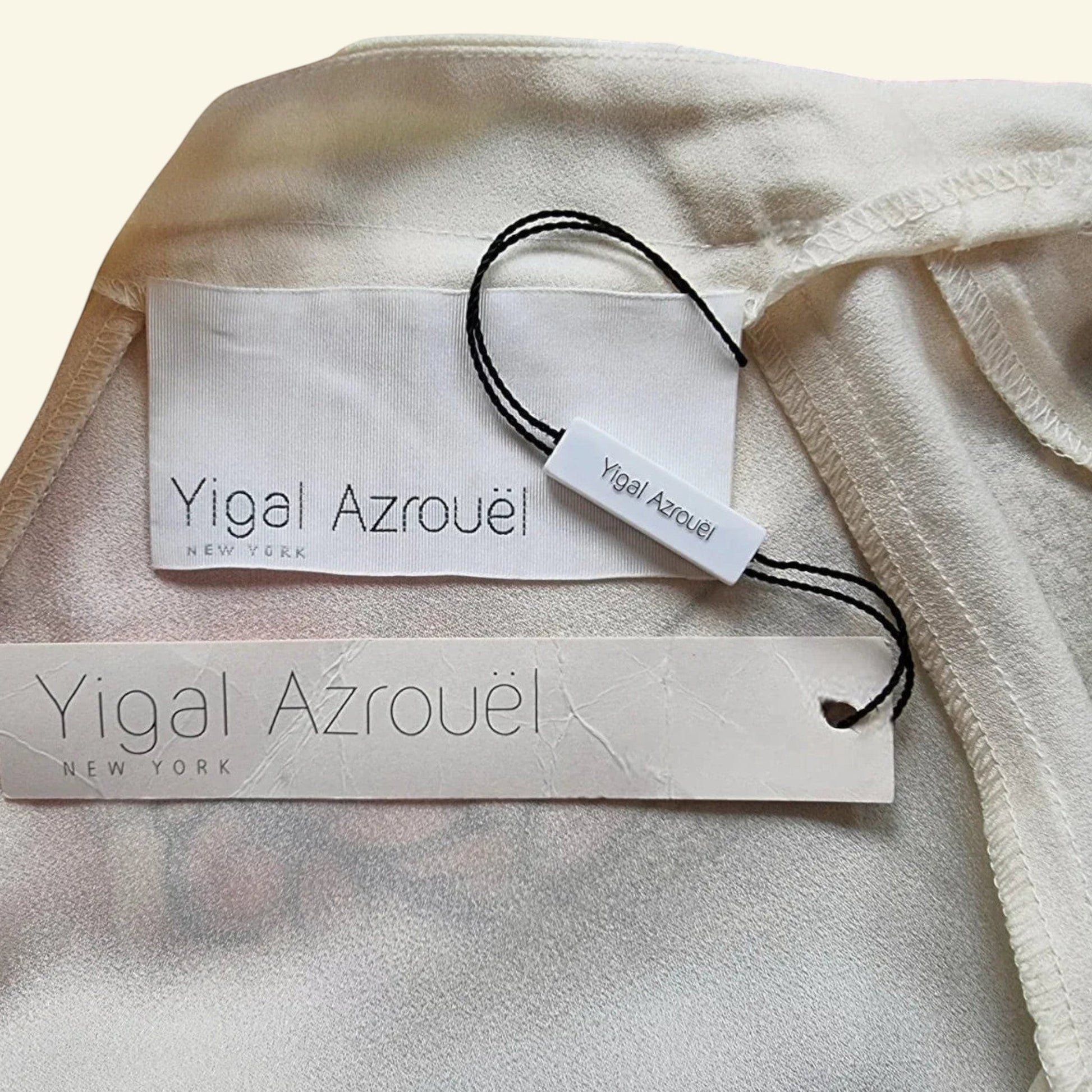 Timelessfashions Yigal Azrouël cream silk top with black crossover ruched pencil skirt detail. Elegant designer dress.