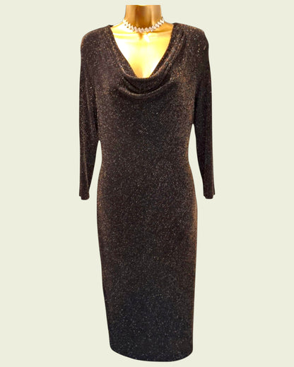 Black glittery dress on a mannequin against a white background