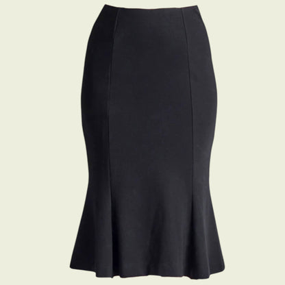 Black pencil skirt on a beige background