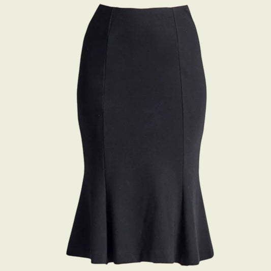 Black pencil skirt on a beige background