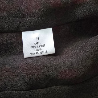 Clothing label on a dark fabric background