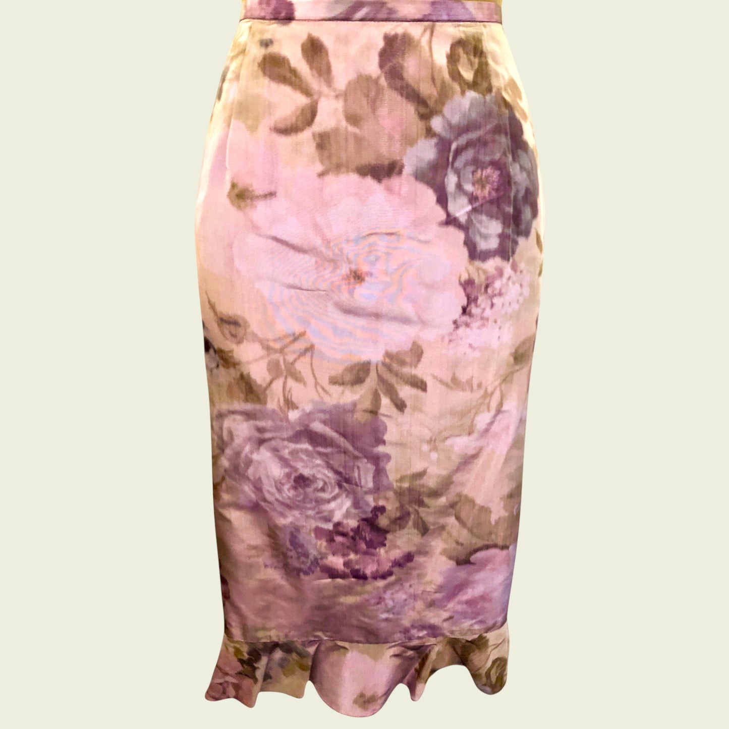 Floral patterned dress on a beige background