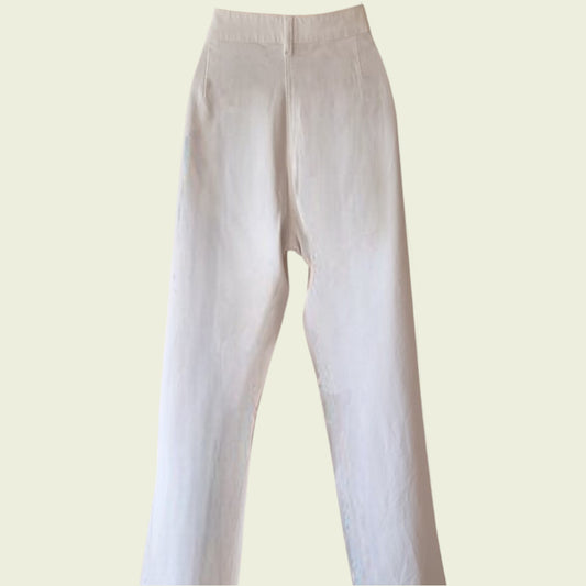 White jeans pants on a light beige background