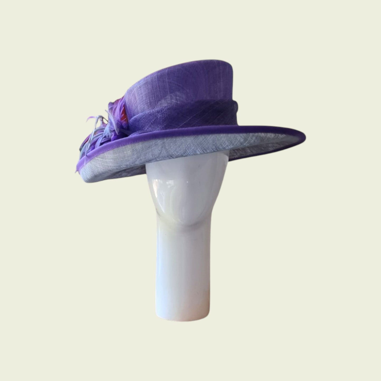 mauve hat on beige background
