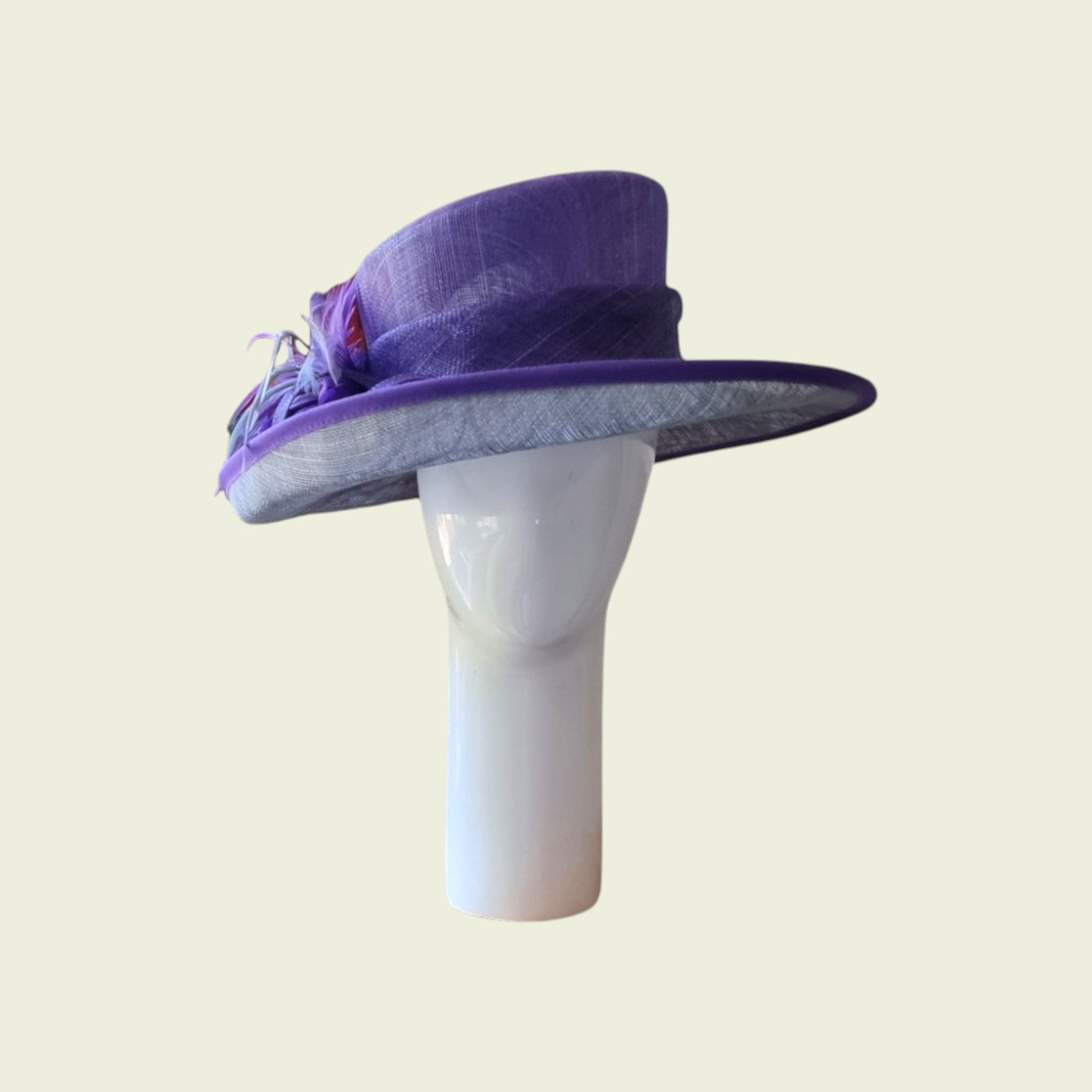 mauve hat on beige background